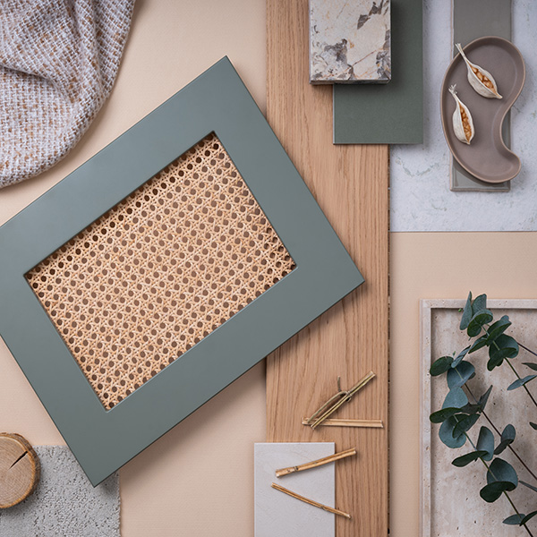 wood moodboard with textile and paint samples, panels and cement tiles. Stylish interior designer moodboard. Light beige and green color palette.